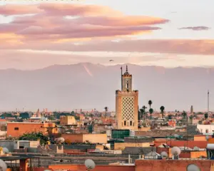 Best cities to visit in Morocco — Marrakech rooftops with the Atlas Mountains behind