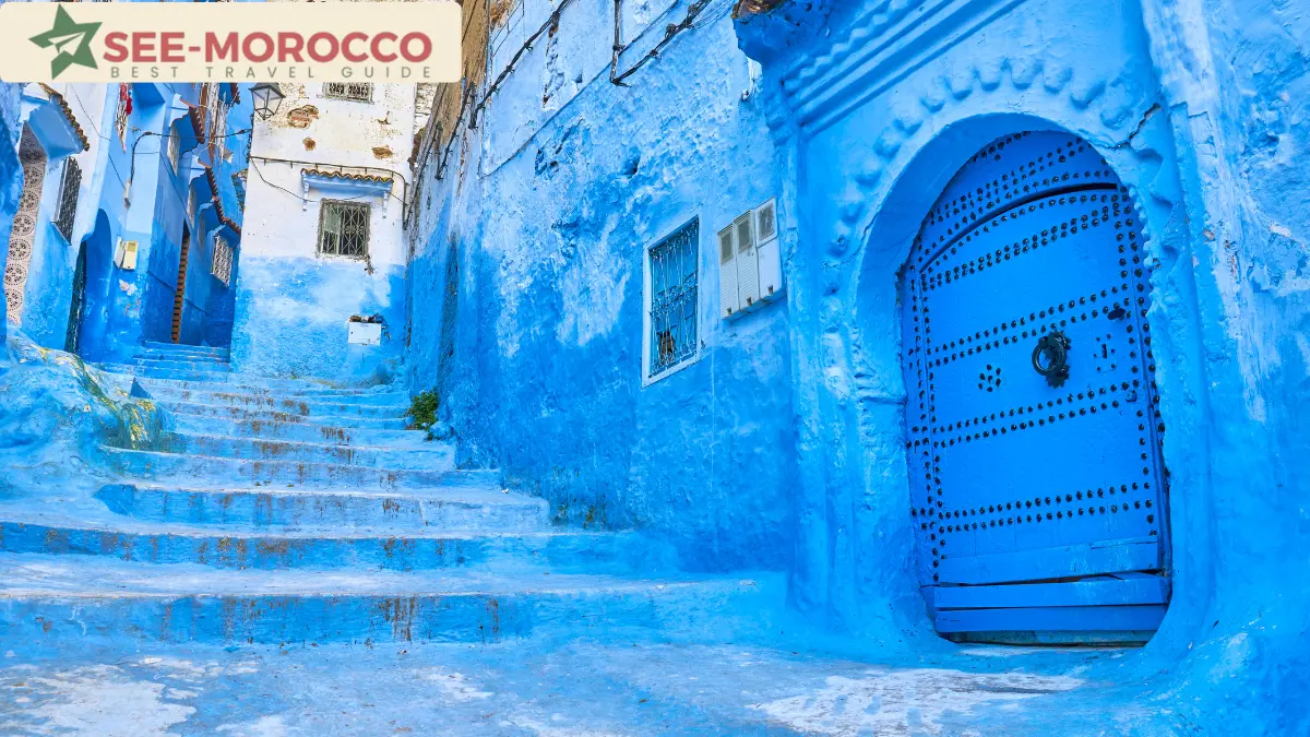 Blue-painted alley and door in Chefchaouen the blue city Morocco