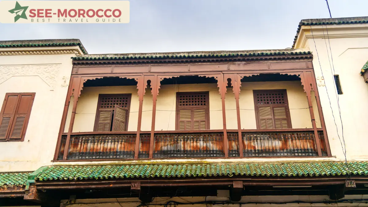 Traditional wooden balconies and windows in the Mellah, Fez's Jewish quarter