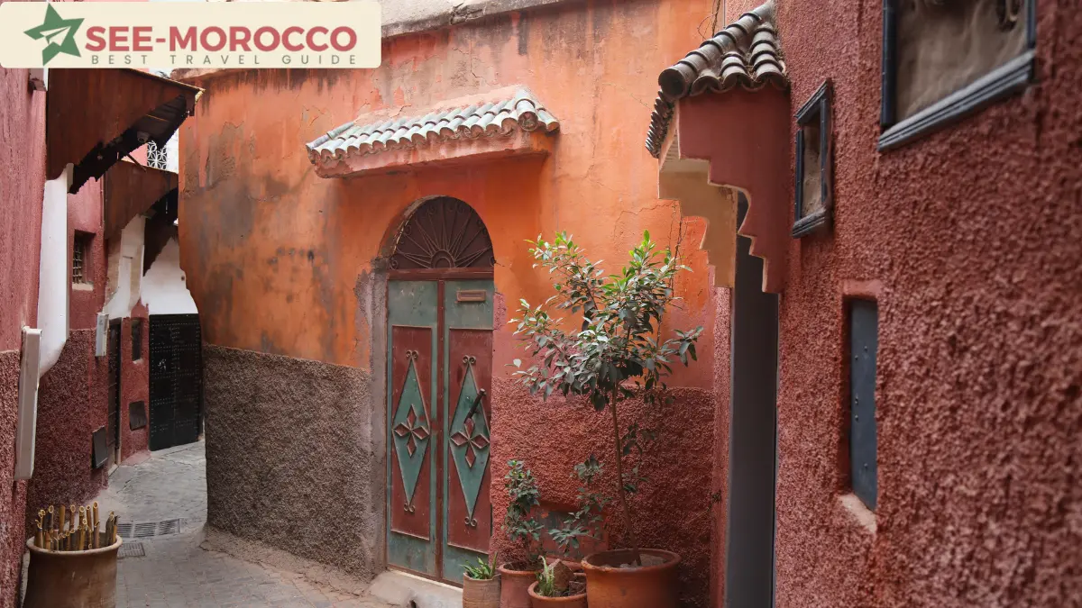 Narrow street with old architecture in the Marrakech medina