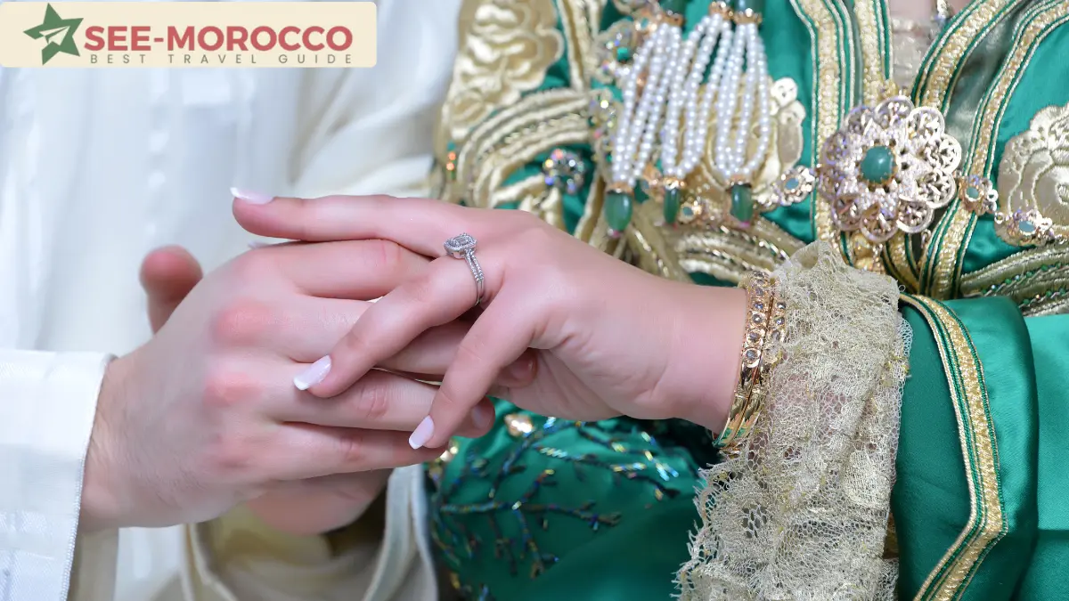 Close-up of an embroidered green takchita worn at a Marrakech wedding