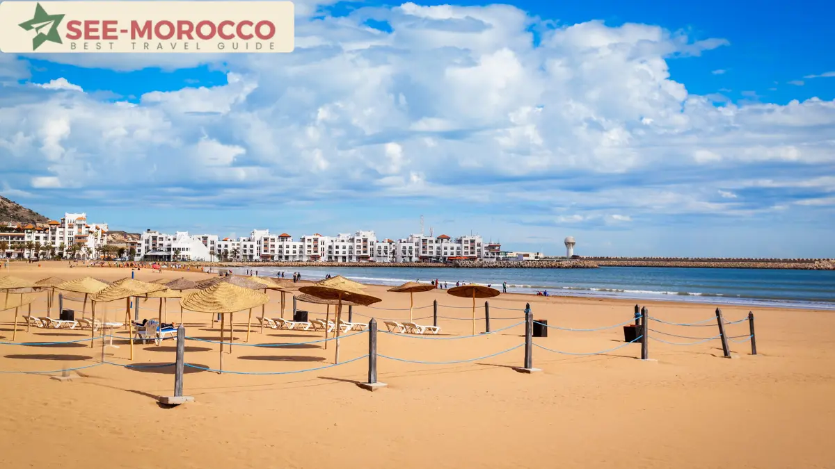 Agadir Morocco beach with sun umbrellas and resort hotels