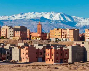 Ouarzazate Morocco city with snow-capped Atlas Mountains in background winter