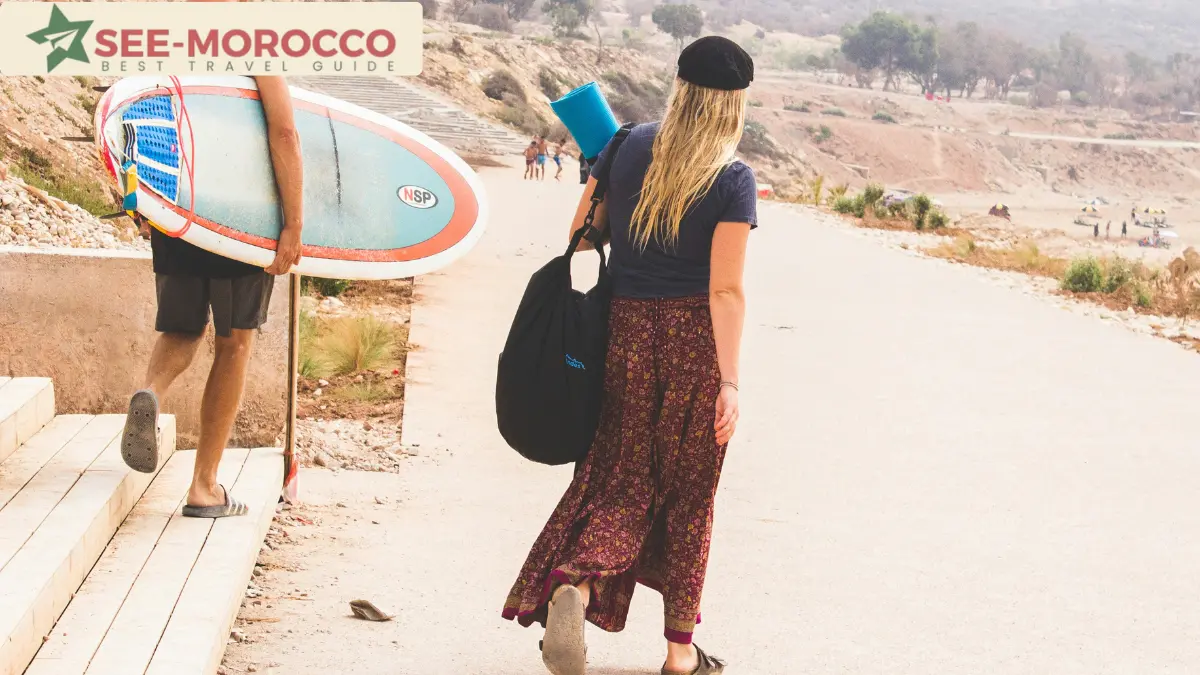 surfers heading to beach near Agadir Morocco Taghazout