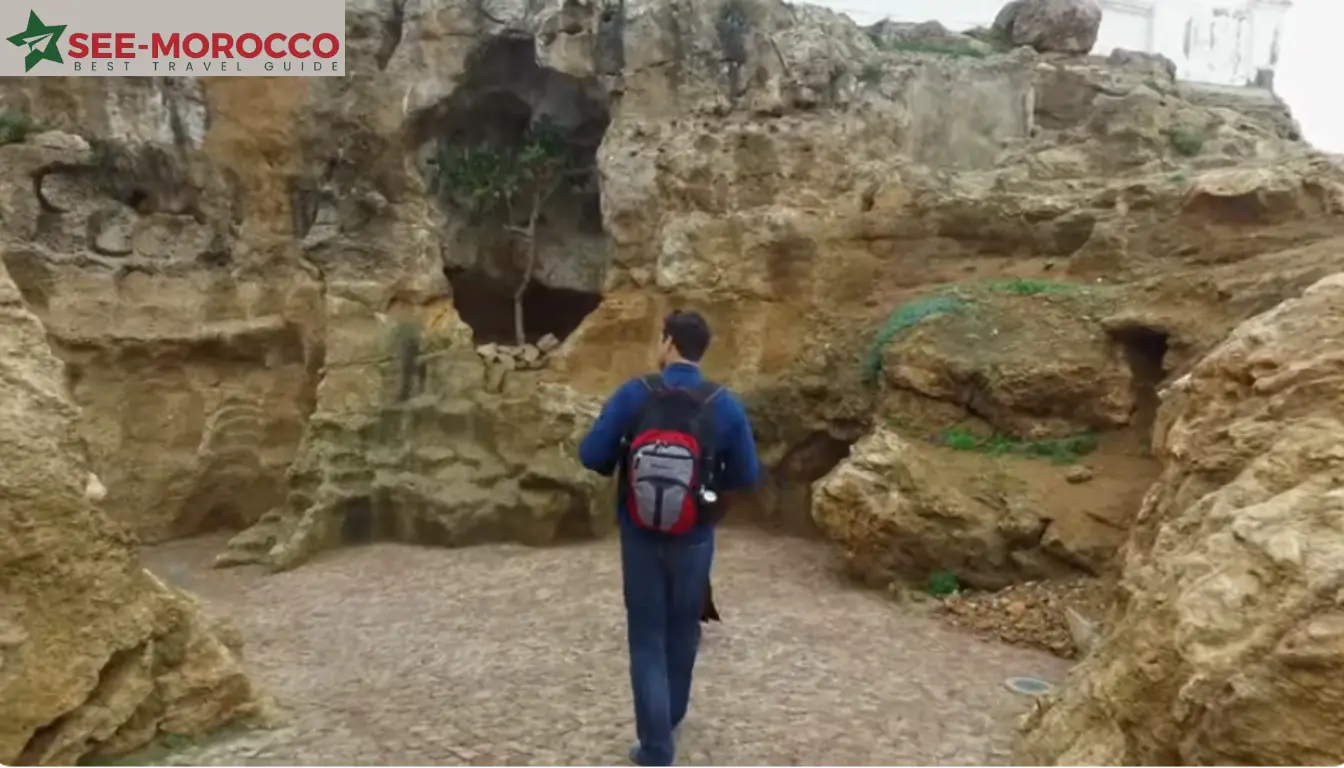 Tangier Morocco tourist attractions — visitor exploring Caves of Hercules near Cape Spartel