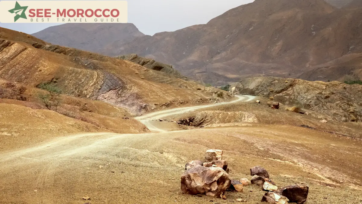 winding road through southern Morocco mountains toward Merzouga