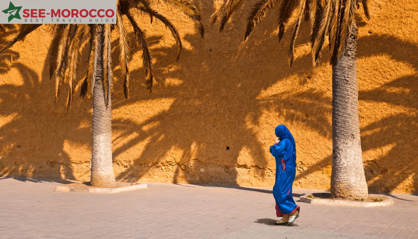 Is Morocco safe — Moroccan woman in traditional djellaba walking safely in city