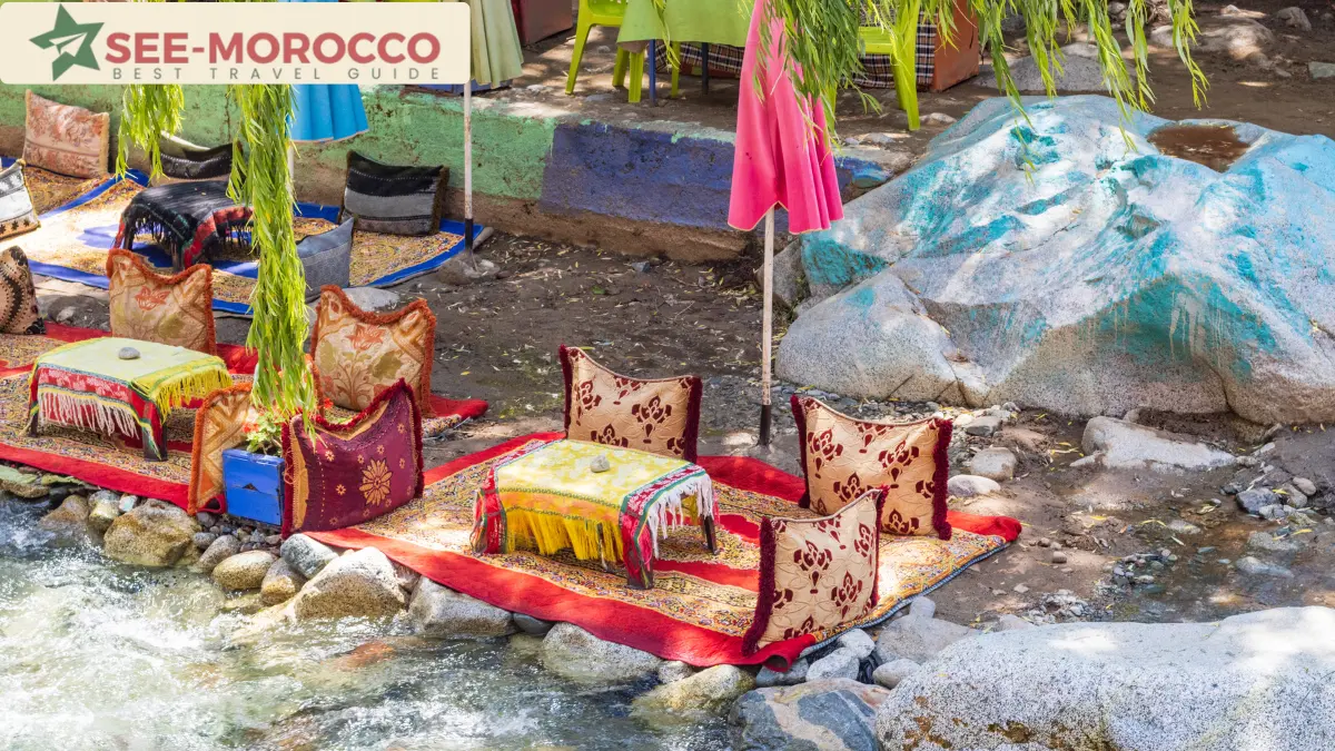 Ourika Valley riverside carpet cafe seating Morocco