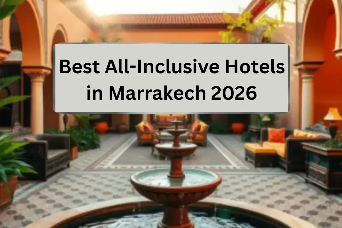 Best all-inclusive hotels in Marrakech - luxury resort pool with palm trees and Atlas Mountains view