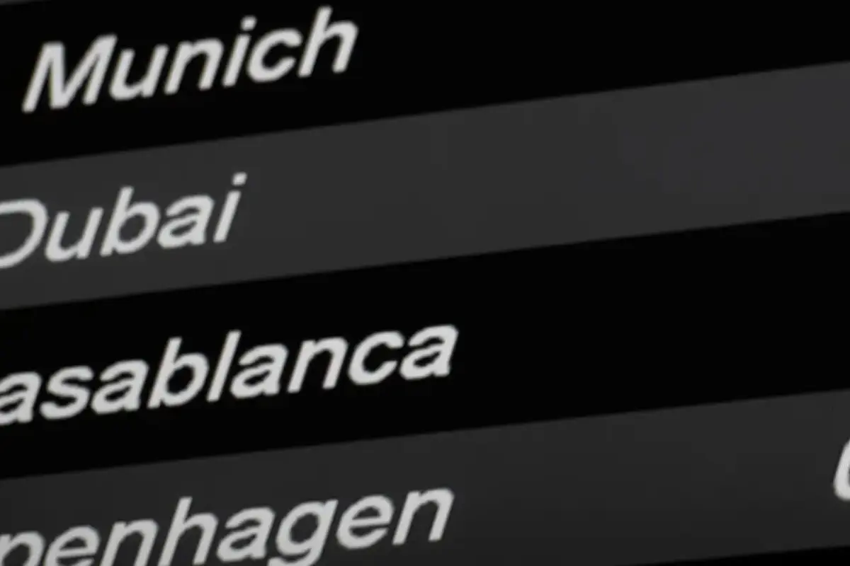Direct flights to Morocco — airport departures board showing Casablanca destination