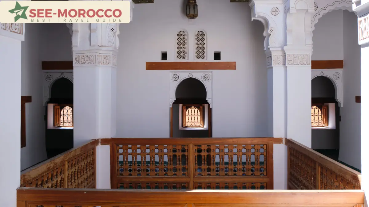 carved arches and cedarwood railings inside riad Marrakech